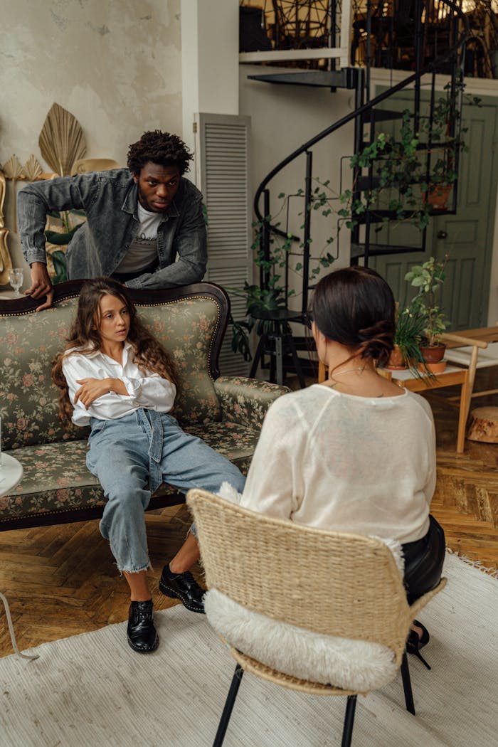 services-02 Intimate family therapy session in a stylish and cozy loft setting.
